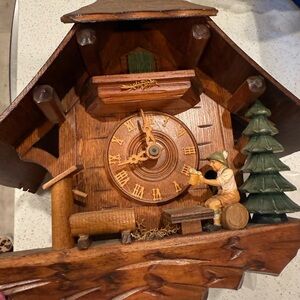 Rustic Brown Cuckoo Clock with Green Accents